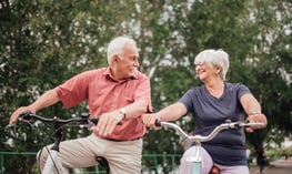 Older couple staying active during the final decade of life to preserve mobility and independence.  